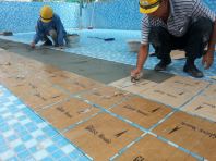 INSTALLATION OF SWIMMING POOL TILING